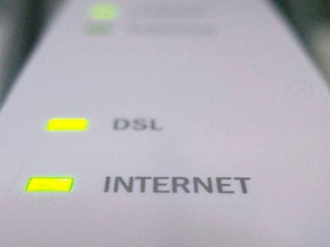 A white box with the word dsl and internet written on it.